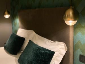 Postel nebo postele na pokoji v ubytování Re Sale Boutique Hotel