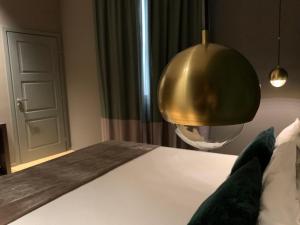 Postel nebo postele na pokoji v ubytování Re Sale Boutique Hotel