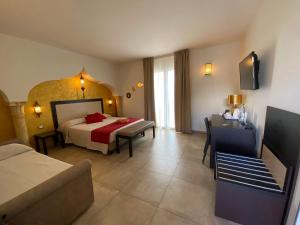 RIAD Comfort Rooms客房内的一张或多张床位