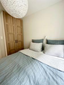 Postel nebo postele na pokoji v ubytování Knøsesmauet Apartment