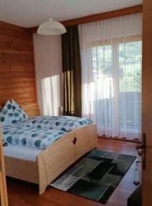 Posteľ alebo postele v izbe v ubytovaní Lasserhof