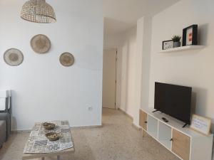 TV a/nebo společenská místnost v ubytování Mima
