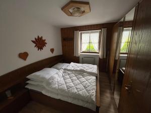 Postel nebo postele na pokoji v ubytování Weinfeldhof