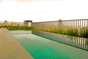 Swimming pool sa o malapit sa Apartamento Palmeiras