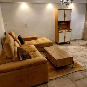 Posezení v ubytování Appartement avec accès privé à la rivière