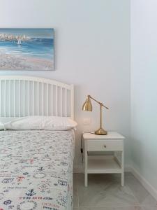 Krevet ili kreveti u jedinici u objektu Casa Vacanze appartamento Riviera