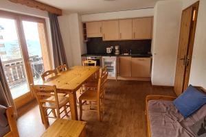 Kuchyň nebo kuchyňský kout v ubytování Appartement 3.5 Nendaz