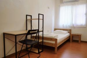 Postel nebo postele na pokoji v ubytování PanPan Hostel
