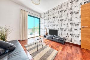TV a/nebo společenská místnost v ubytování Casa Costa Esmeralda-shared pool