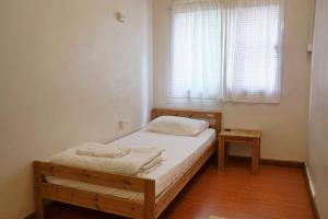 Postel nebo postele na pokoji v ubytování PanPan Hostel