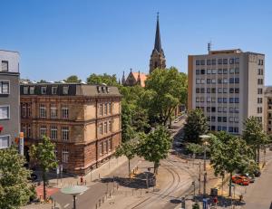 an aerial view of a city with a church at City Suite - 5 Min to HBF in Mannheim