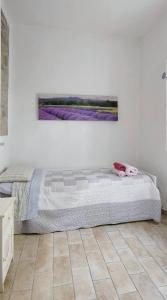 A bed or beds in a room at Villa Elvira