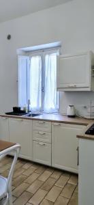 A kitchen or kitchenette at Villa Elvira