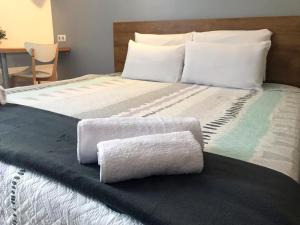 Posteľ alebo postele v izbe v ubytovaní Paraiso Hostel