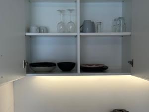 Kuchyň nebo kuchyňský kout v ubytování Studio Apartment near Linz Main Train Station