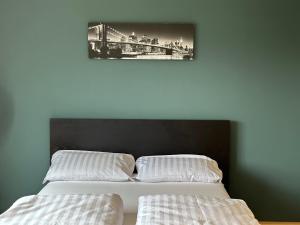 Postel nebo postele na pokoji v ubytování Studio Apartment near Linz Main Train Station
