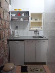 A kitchen or kitchenette at Apartments StellaMar