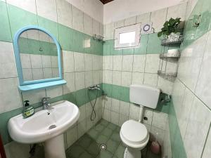 Koupelna v ubytování Boungainvillea
