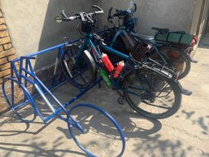 two bikes are parked next to each other at Salom Hostel in Panjakent