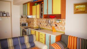 Kuchyň nebo kuchyňský kout v ubytování Nada SeaView Apartment