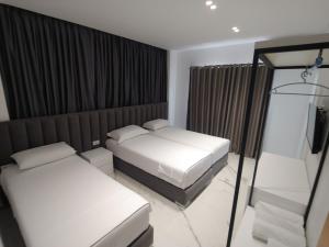 Postel nebo postele na pokoji v ubytování Hotel ZEKA