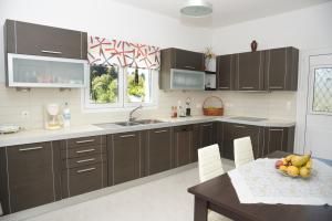 A kitchen or kitchenette at Olgas Luxury Villa, Corfu Greece