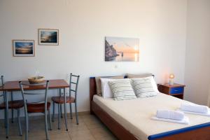 Postel nebo postele na pokoji v ubytování Lappas Rooms