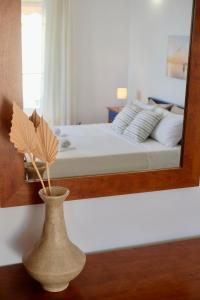 Postel nebo postele na pokoji v ubytování Lappas Rooms