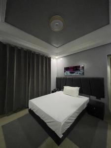Hotel la Perle d'Arfoud客房内的一张或多张床位