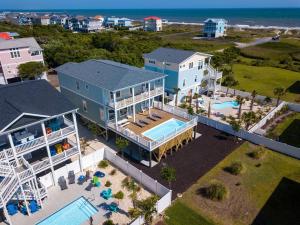 Bazén v ubytování Sally's Sandcastle nebo v jeho okolí