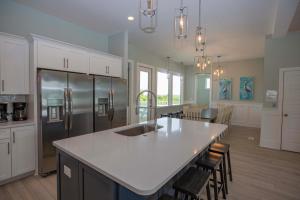 Kuchyň nebo kuchyňský kout v ubytování Sally's Sandcastle