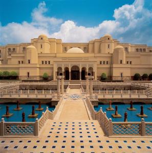 a large building with a fountain in front of it at The Oberoi Amarvilas Agra in Agra