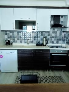 Kuchyň nebo kuchyňský kout v ubytování Eryaman, Wide Luxury Rezidance