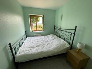 Ένα ή περισσότερα κρεβάτια σε δωμάτιο στο Cottage with Splendid Views