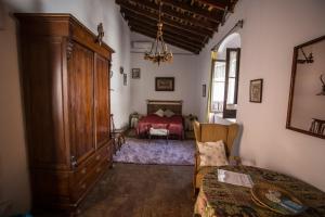 Posteľ alebo postele v izbe v ubytovaní La Casa del Cura 1935