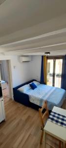 Postel nebo postele na pokoji v ubytování 3 Apartamento tipo estudio ideal para tus vacaciones