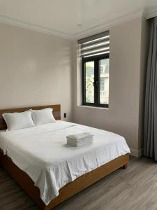 Ένα ή περισσότερα κρεβάτια σε δωμάτιο στο An's House Apartment #Manhattan 08-02