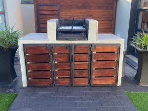 a wooden dresser with a toaster on top of it at 12 Calderbank in Potchefstroom