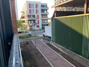 a white van is parked on the side of a street at Central 1 bedroom apartment NB!! Small room in Oslo