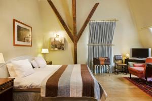 Postel nebo postele na pokoji v ubytování Martin's Relais