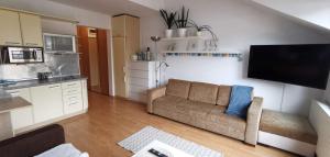 Kuchyňa alebo kuchynka v ubytovaní Apartament Pomorski