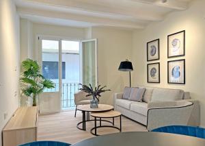 Apartamentos Soho Boutique Palillero的休息区