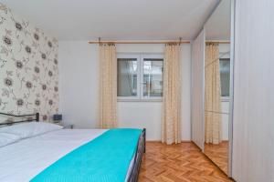 Posteľ alebo postele v izbe v ubytovaní Cakic apartmani