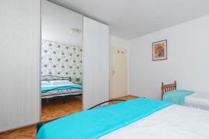 Posteľ alebo postele v izbe v ubytovaní Cakic apartmani