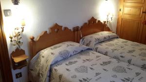 Ліжко або ліжка в номері Ca' dello Scoiattolo