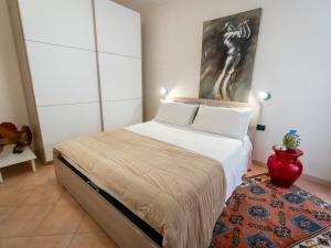 Katil atau katil-katil dalam bilik di Serafino - nice terrace & swimming pool on the Iseo Lake
