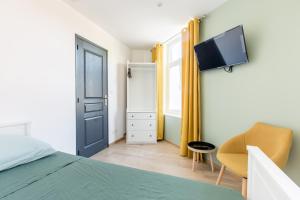 Fotografia z galérie ubytovania Cosy house 10P - 5 chambres -5 salles de bain - proche Lille et toutes commodités v destinácii Roubaix