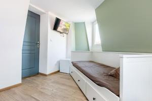 Fotografia z galérie ubytovania Cosy house 10P - 5 chambres -5 salles de bain - proche Lille et toutes commodités v destinácii Roubaix