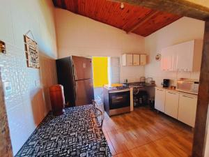 Kuchyň nebo kuchyňský kout v ubytování Casa de Campo Pedra Bicuda