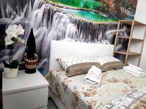 Postel nebo postele na pokoji v ubytování Apartman Juga